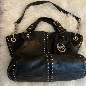 Black leather Michael Kors handbag.